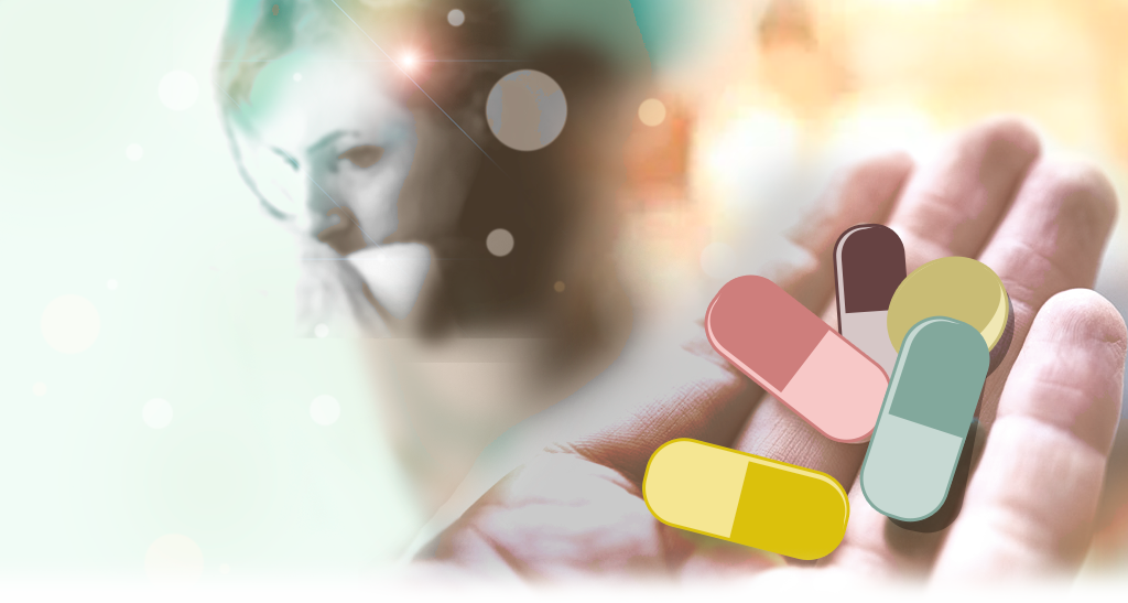 Pastillas de colores en una mano con mujer preocupada de fondo